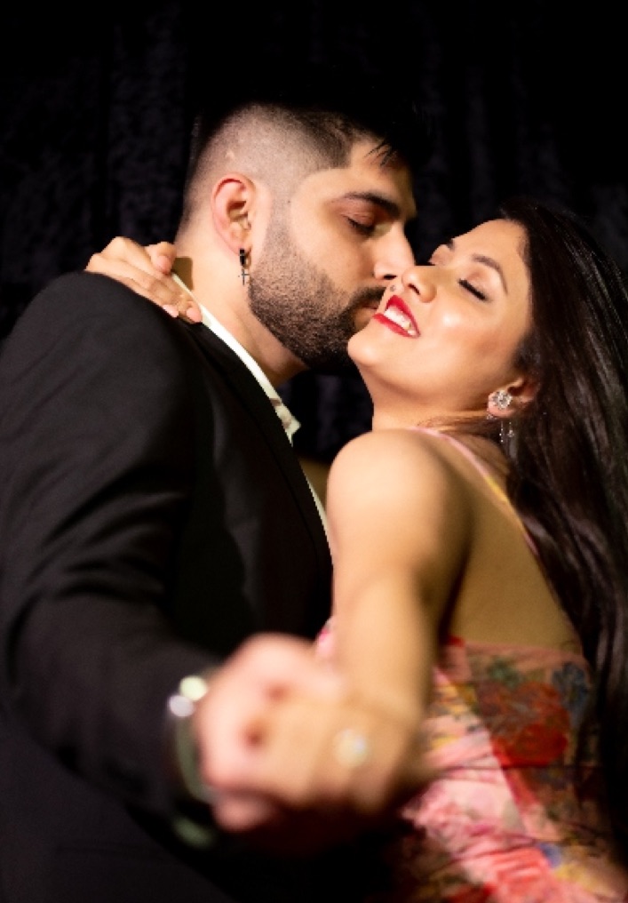 Couple dancing close, about to kiss